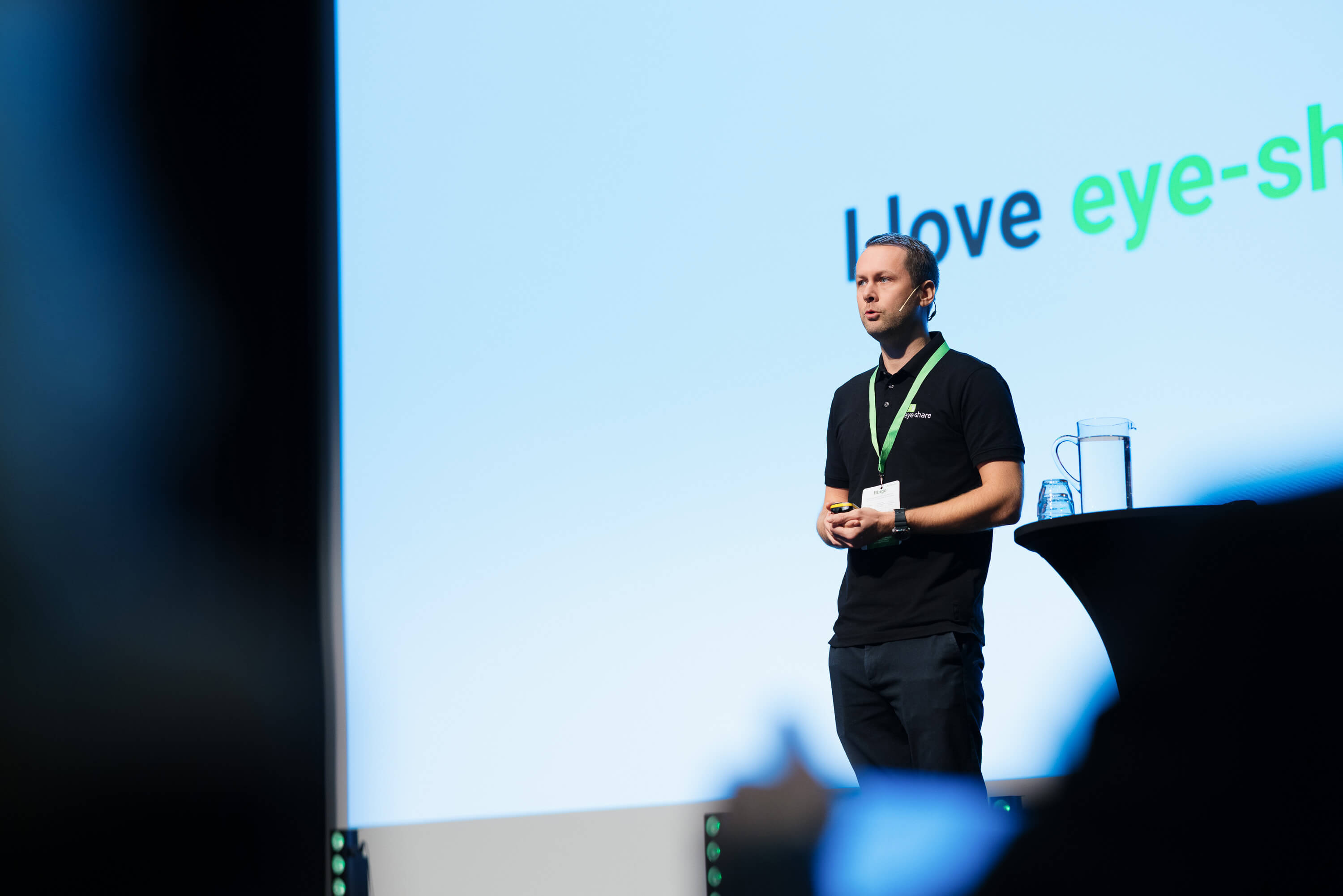 Bernt Bugge presenting on stage