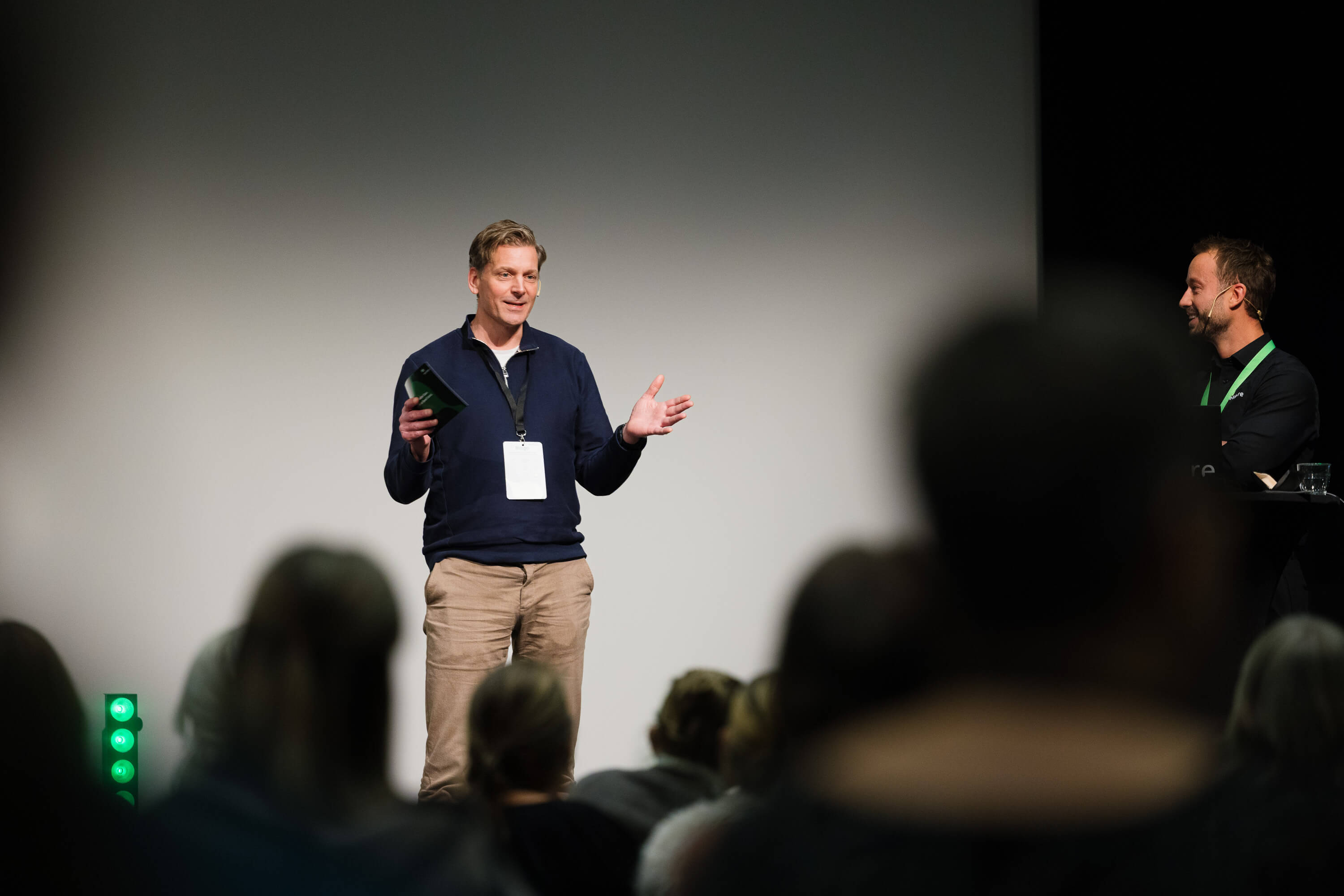 Petter Natvig from Høyskolen Kristiania presenting on stage at eye-share User Conference 2025